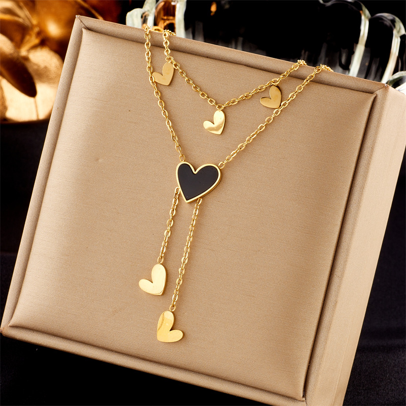 Korean-style simple, fashionable and niche design, oil-dripping glossy heart-shaped tassel irregular double-layer titanium steel necklace full figure