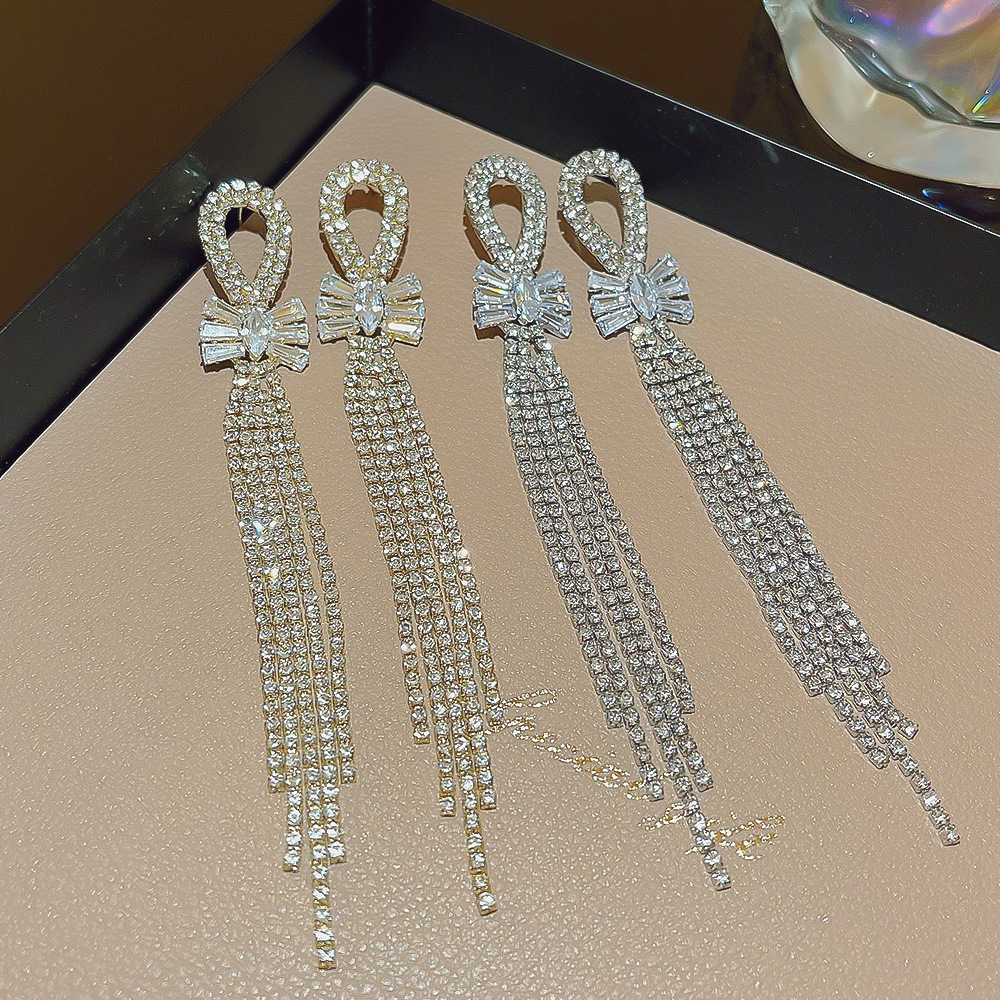 Wholesale of cross-border fashion exaggerated bow tassel earrings and accessories for women, with a light luxury and high-end feel, and a cold style details Picture