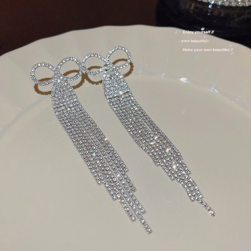 New Korean stylish and versatile bow earrings for autumn and winter, long tassel cold style earrings for women wholesale Specification drawing