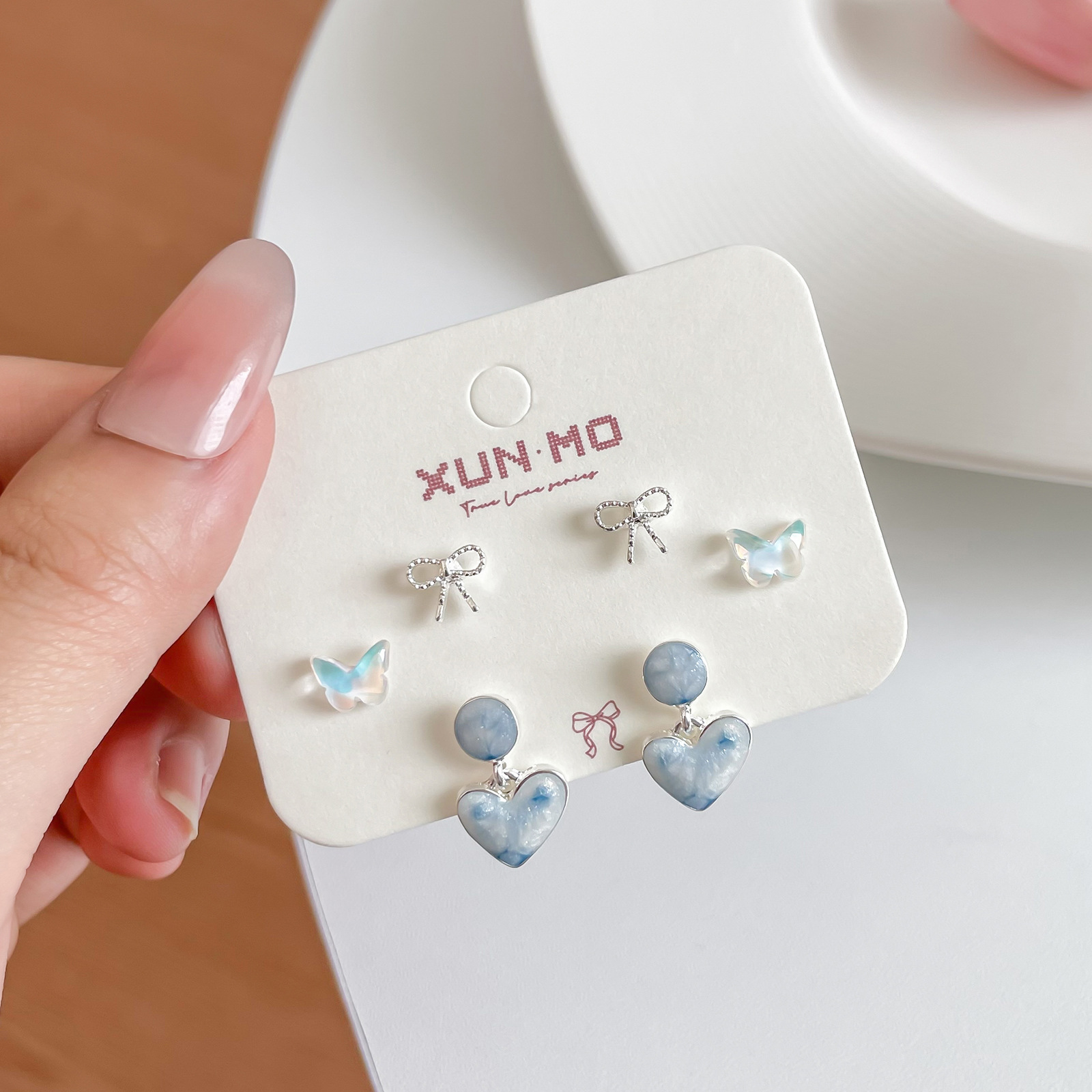 Japanese and Korean super fairy heart-shaped butterfly silver needle stud earrings for women, fresh and sweet, niche and high-end, simple and individual earrings Specification drawing