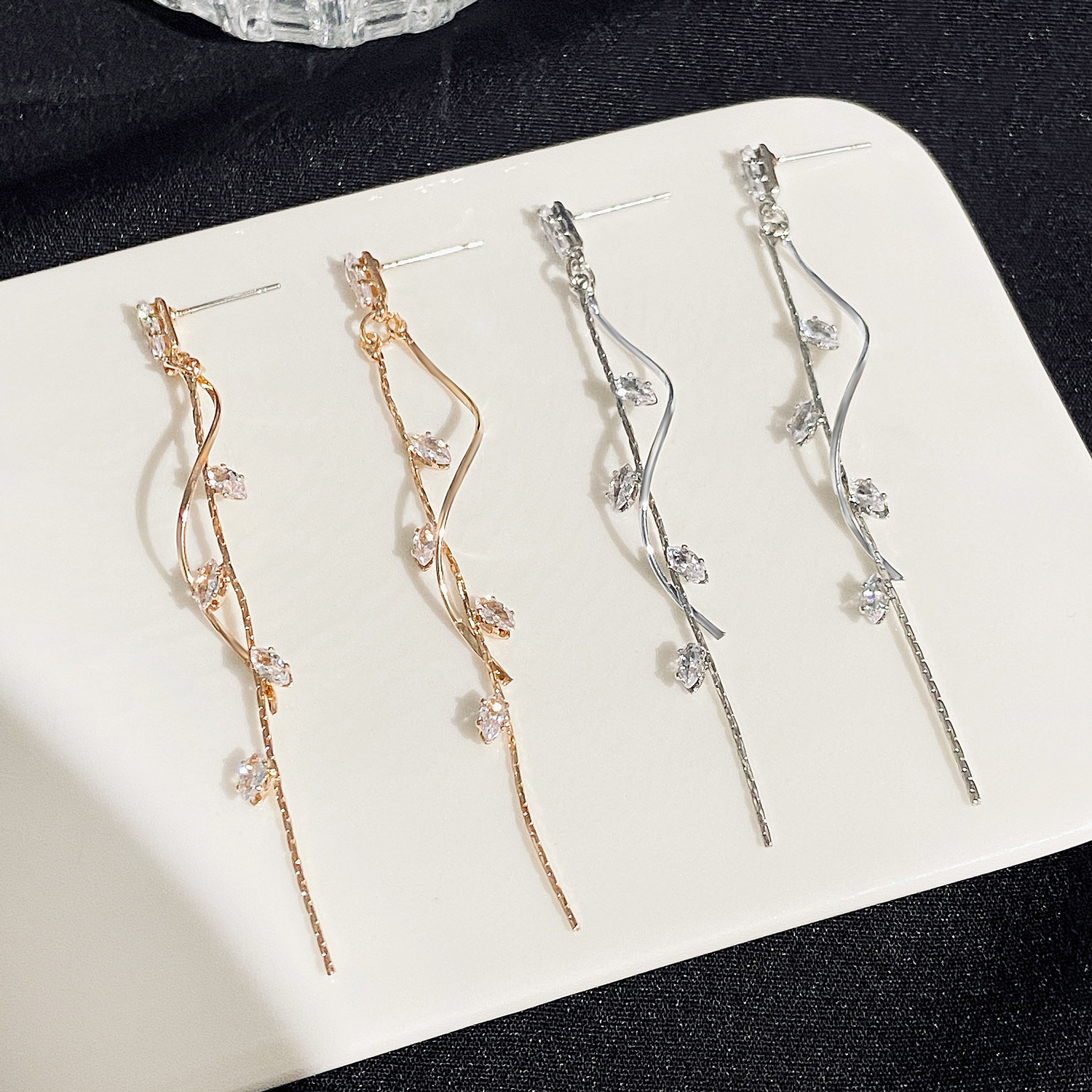 French light luxury long zircon tassel earrings, women's ins style, European and American temperament, rotating and twisted stud earrings, internet-famous earrings Application Scenario