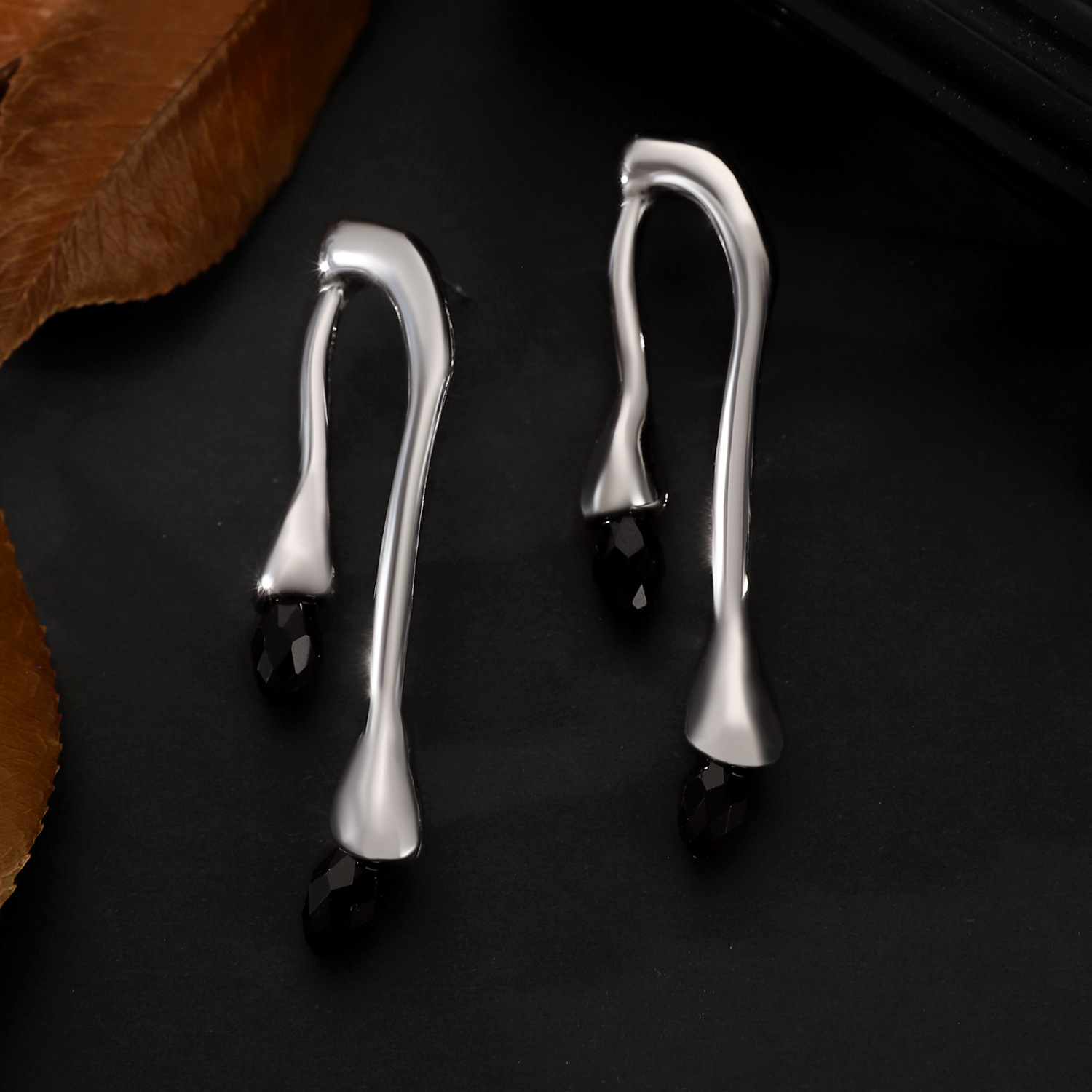 European and American cross-border lava liquid metal stud earrings, irregular black large water drop earrings with female personality, cross-border earrings Application Scenario