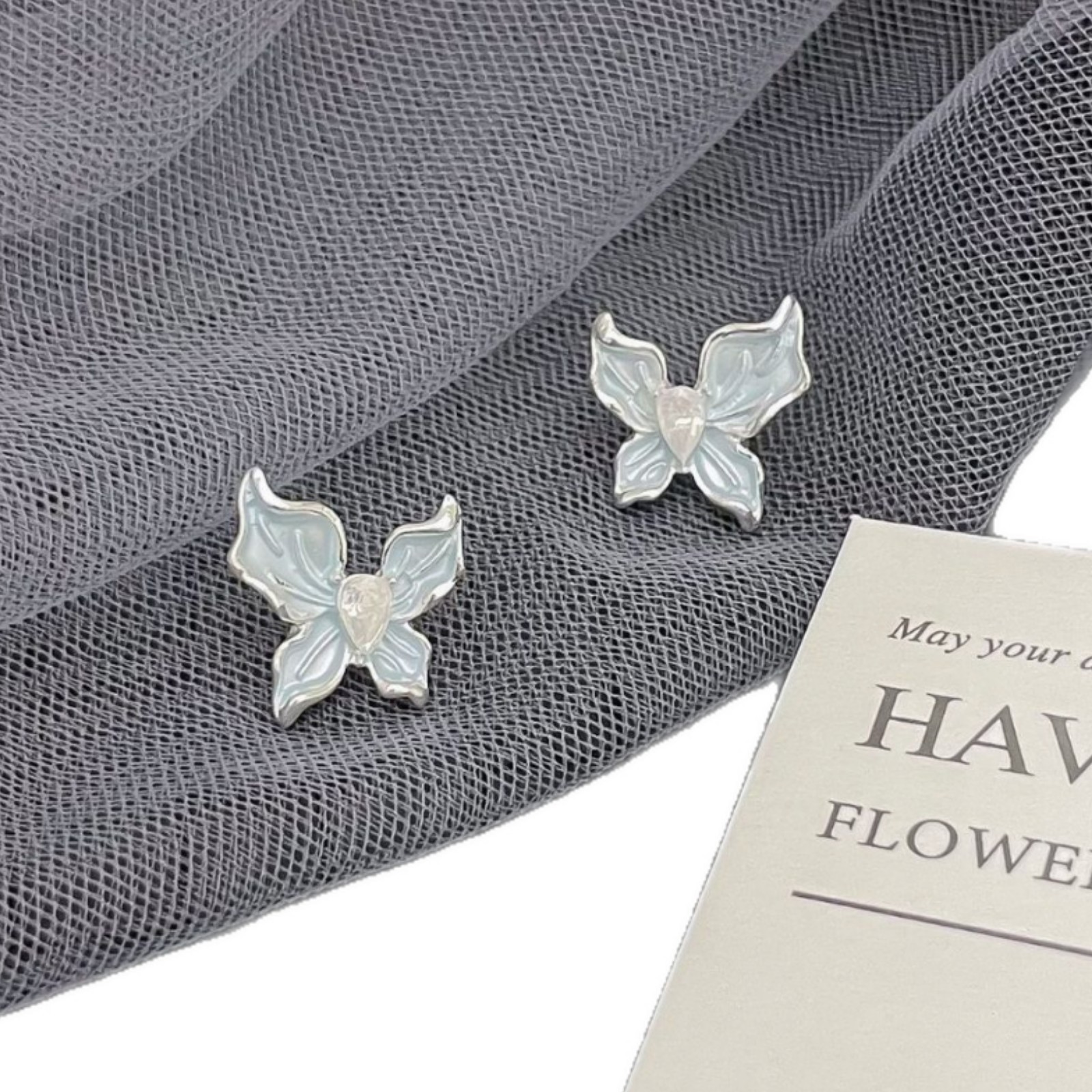 Butterfly earrings, a niche design with a light luxury and high-end feel, are fashionable and exquisite. Zirconia silver needle stud earrings are new spring and summer collection for women Item Picture