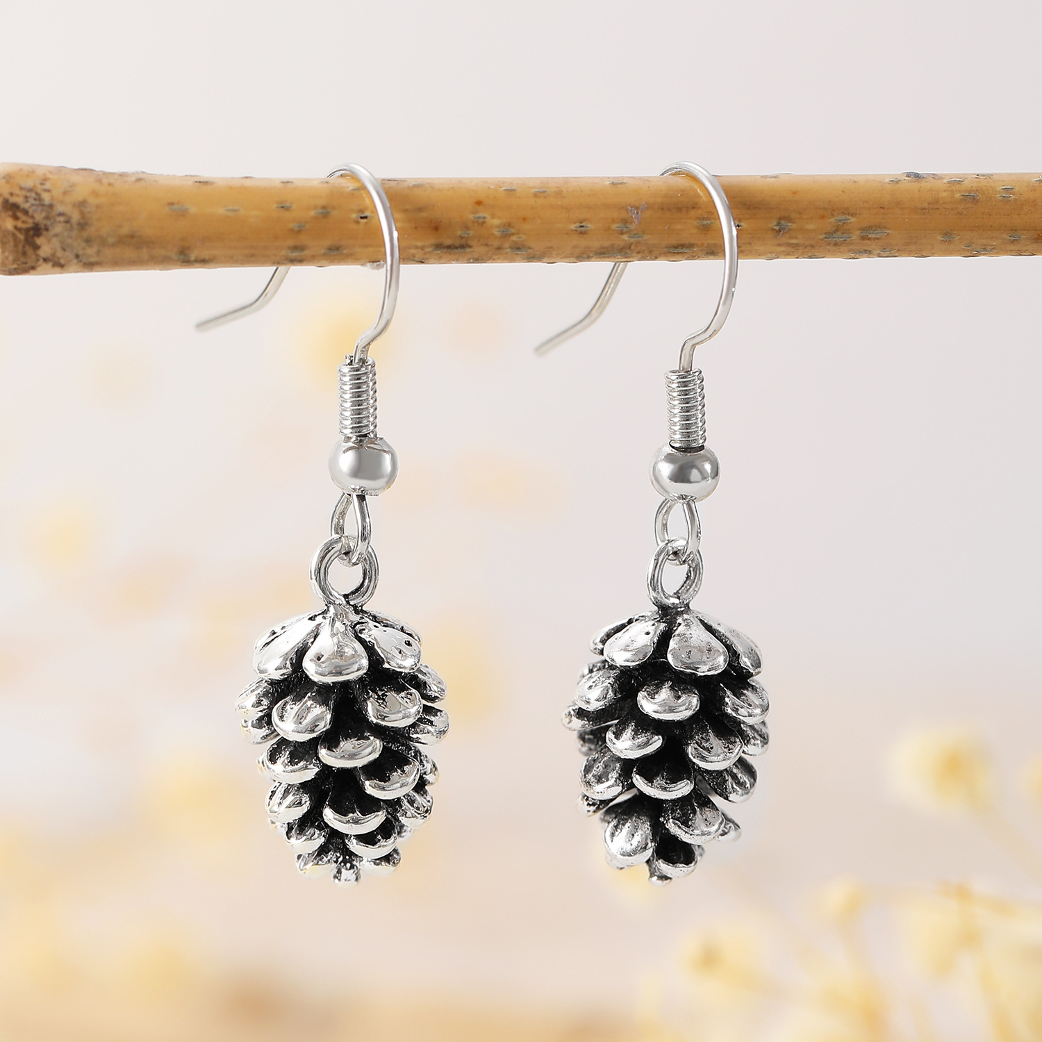 European and American retro fashion Bohemian imitation pinecone earrings, versatile alloy high-end niche earrings for women Application Scenario