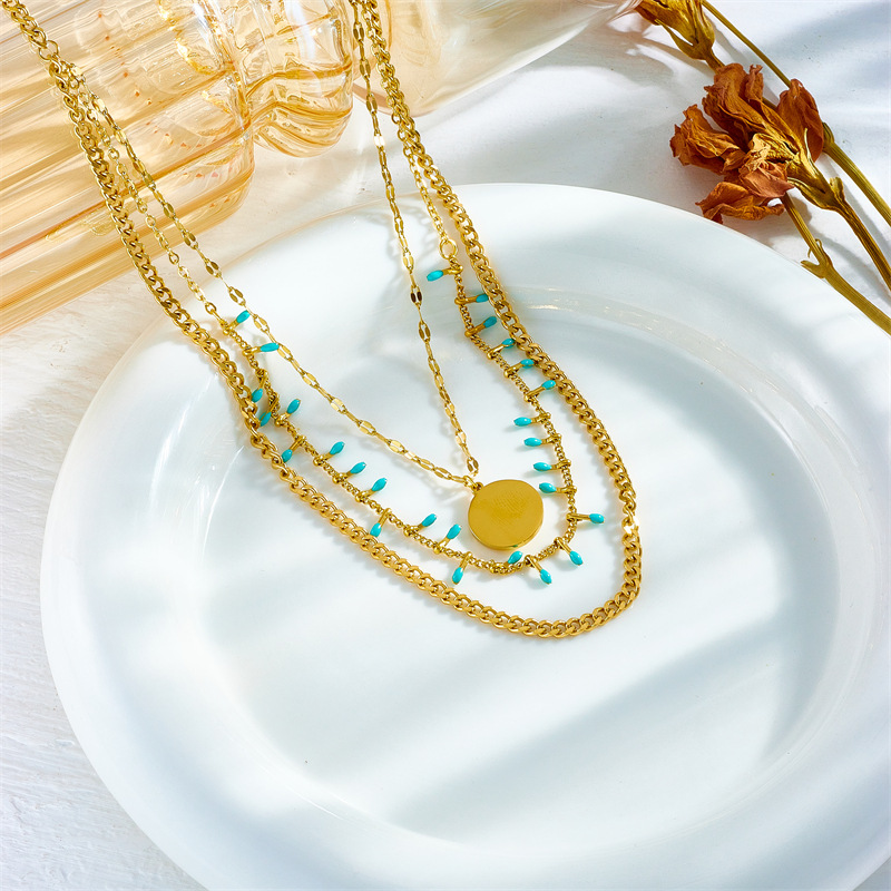 European and American fashion, retro, high-end ethnic style, multi-layer layered blue turquoise round pendant, metal jewelry, titanium steel necklace details Picture
