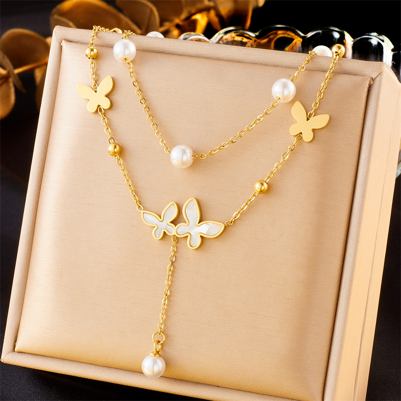 A fashionable, niche, retro and simple double-layer pearl butterfly accessory chain, stainless steel gold-plated jewelry necklace full figure