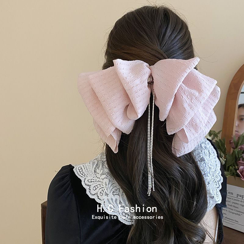 Retro tassel ribbon cloud semi-tied hair spring clip for women, new hair accessory that makes the face look small, back of the head hair clip details Picture