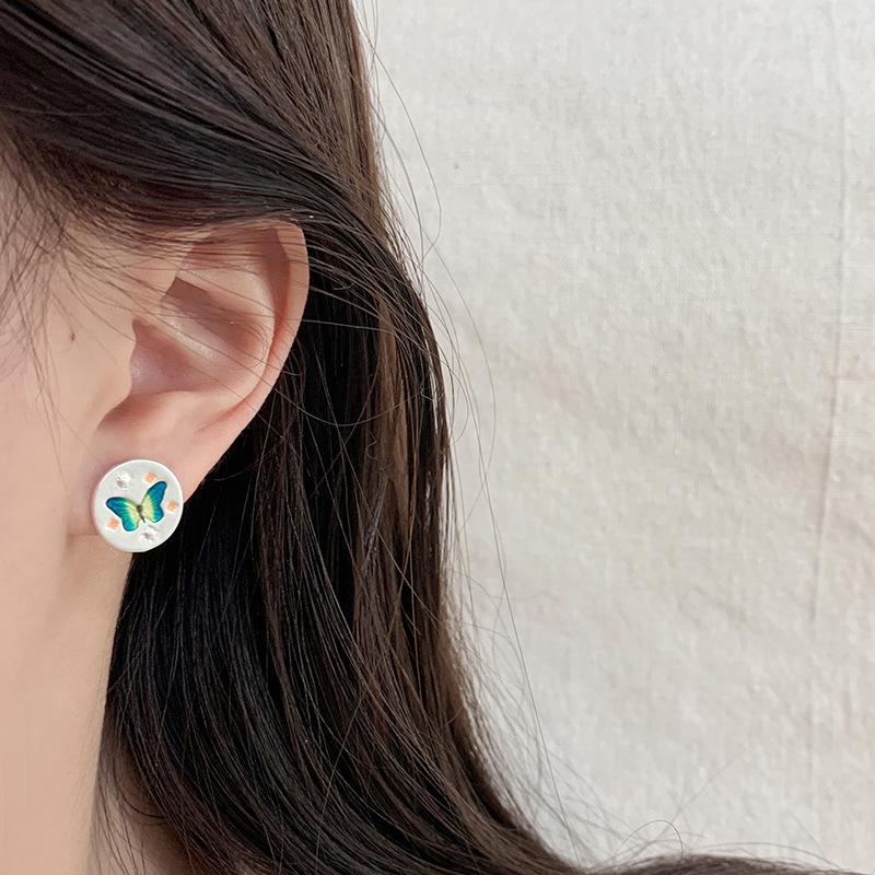 French matte silver retro color oil drip butterfly stud earrings for women's silver needle new niche high-end heart-shaped light luxury earrings Specification drawing