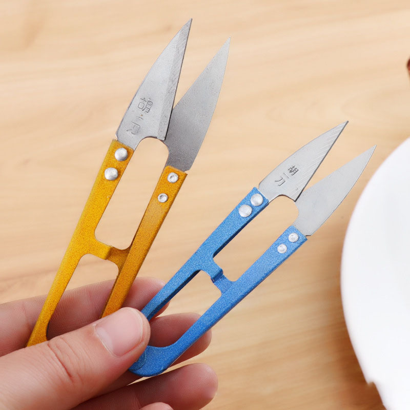 Hu Yidao's U-shaped thread scissors are available at a 2-yuan store in Yiwu. They are household cross-stitch scissors and spring thread scissors details Picture