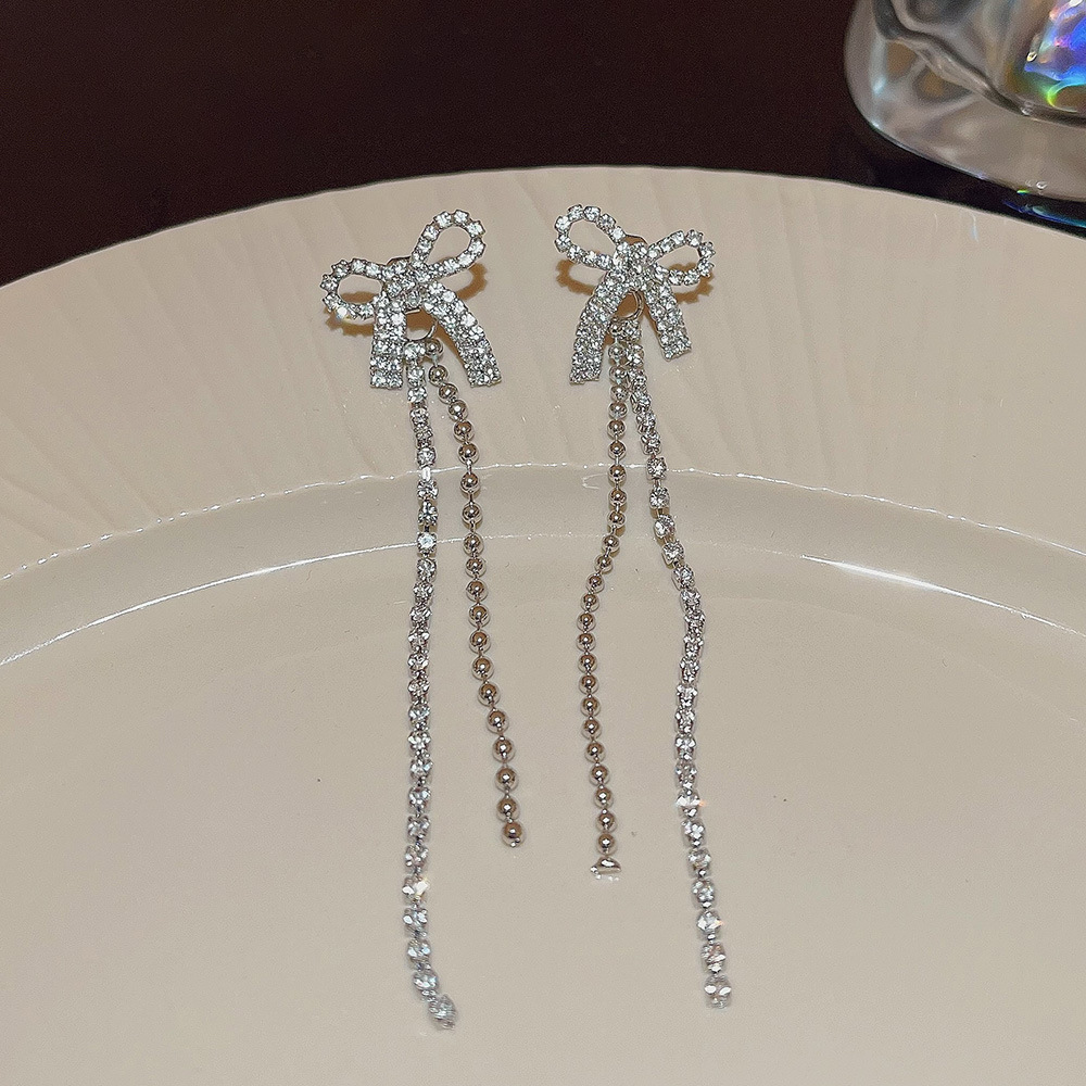 S925 Silver Needle Super Shiny, simple and fashionable bow earrings, niche high-end, trendy design, long earrings wholesale details Picture