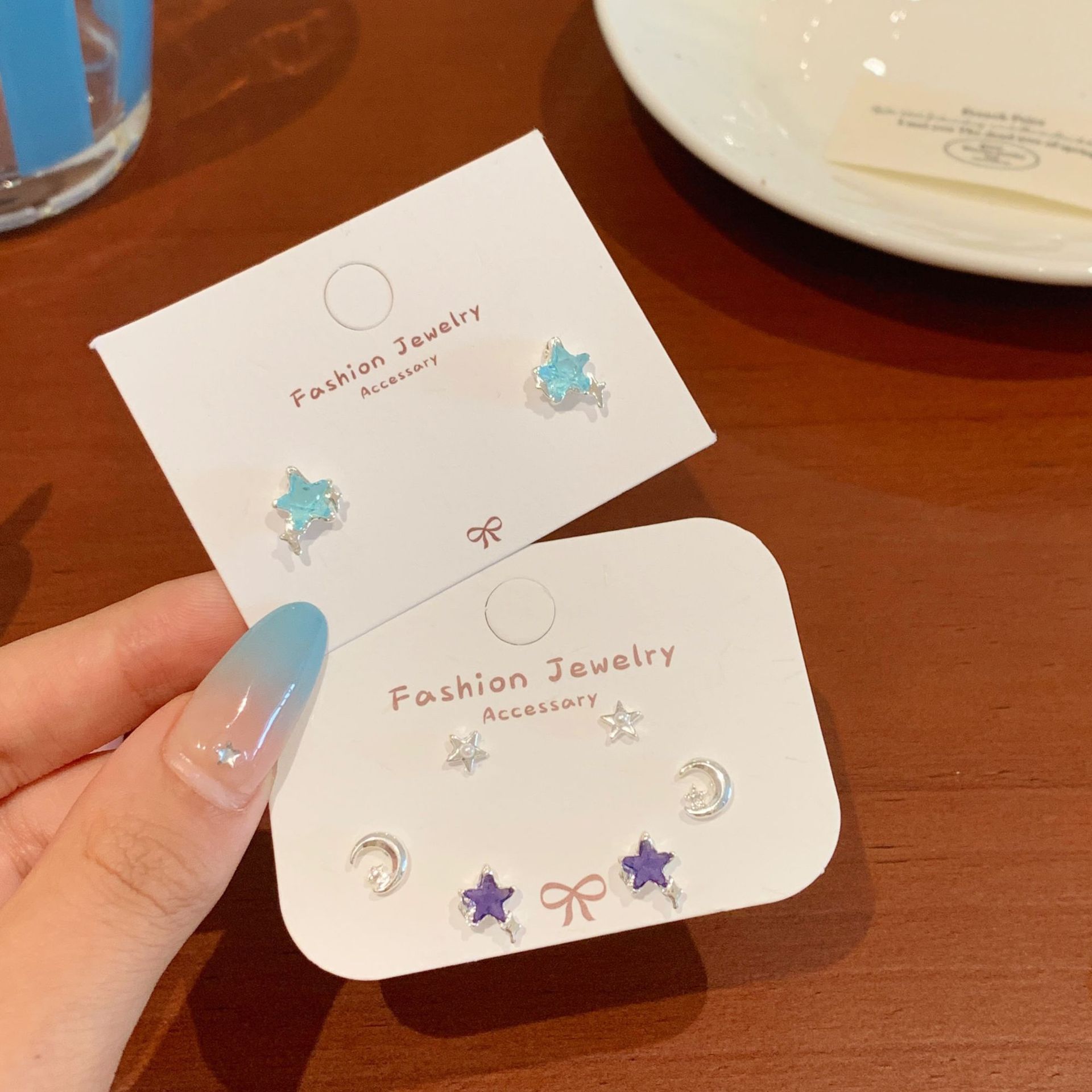 Blue zircon five-pointed star moon stud earrings, silver needle for women, small design sense, simple and elegant ear-piercing, student earrings full figure