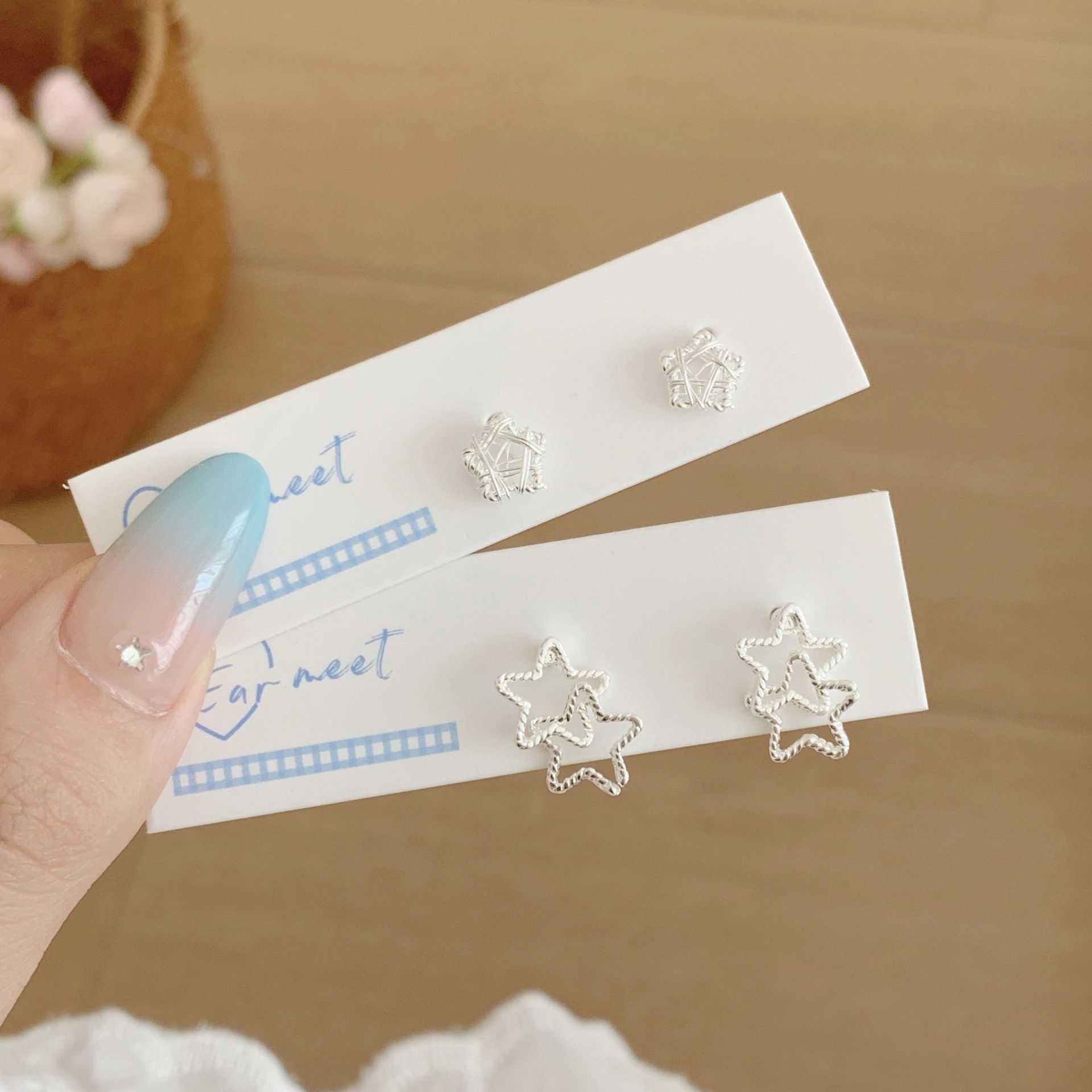 Korean-style silver woven hollowed-out star stud earrings for women, small, ins style, simple and elegant, individual student earrings Application Scenario