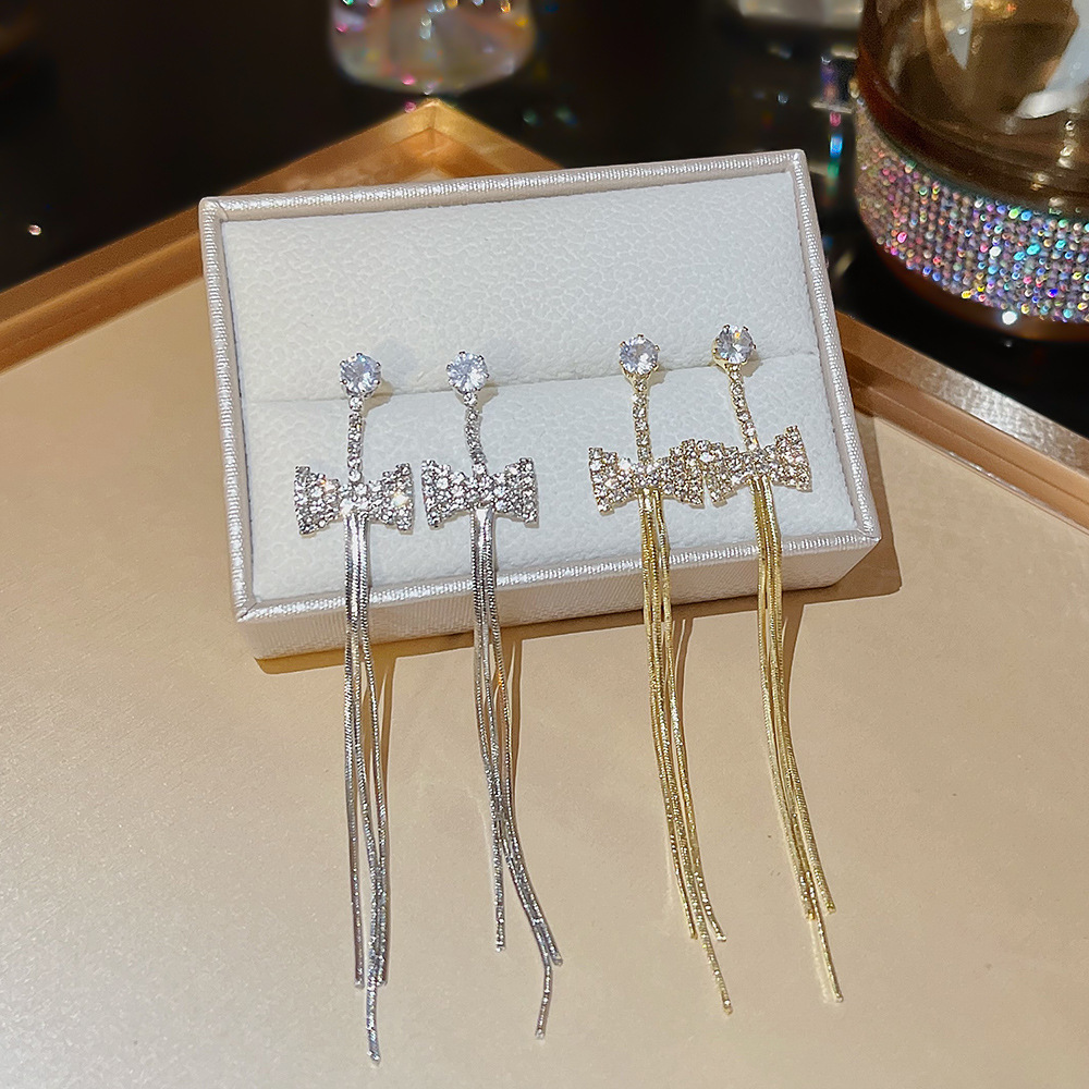 Light luxury, versatile, trendy bestsellers, fashionable and exquisite tassel earrings, niche high-end and elegant long bow earrings full figure