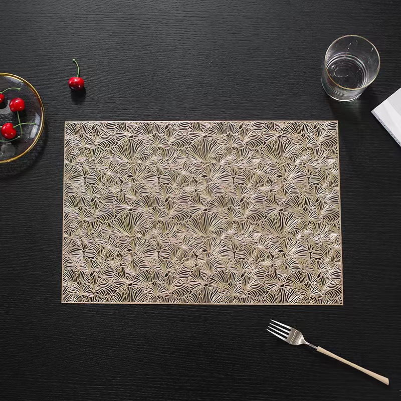 Factory direct sales of Ginkgo leaf hollowed-out placemats, hotel and home decoration, PVC waterproof and wear-resistant placemats, heat insulation pads wholesale Application Scenario