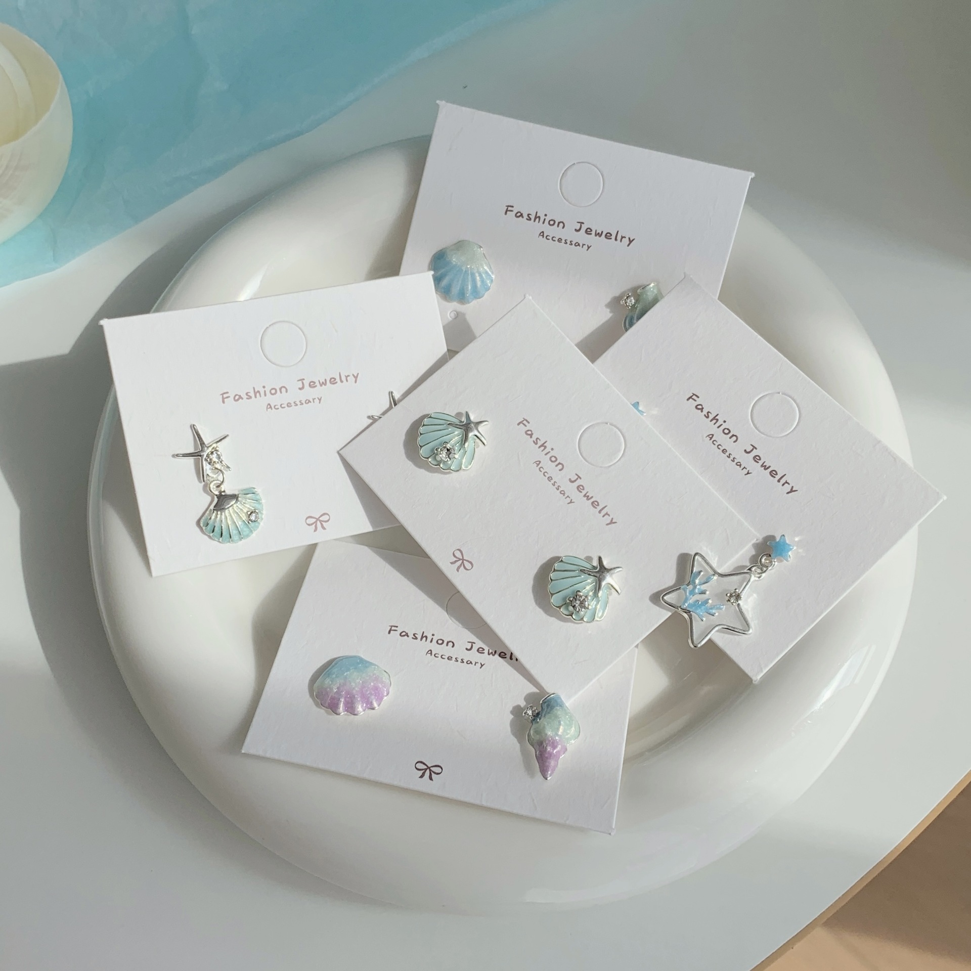 Summer super fairy ocean starfish shell zircon earrings, women's silver needle exquisite design sense pearl fish tail tassel earrings Application Scenario