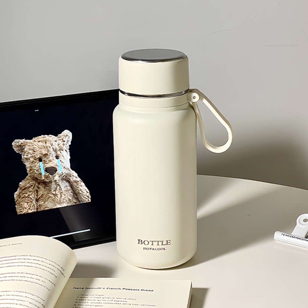 Wholesale of fashionable and simple stainless steel insulated cups, outdoor water cups for couples, portable vacuum tea cups with tea separators full figure