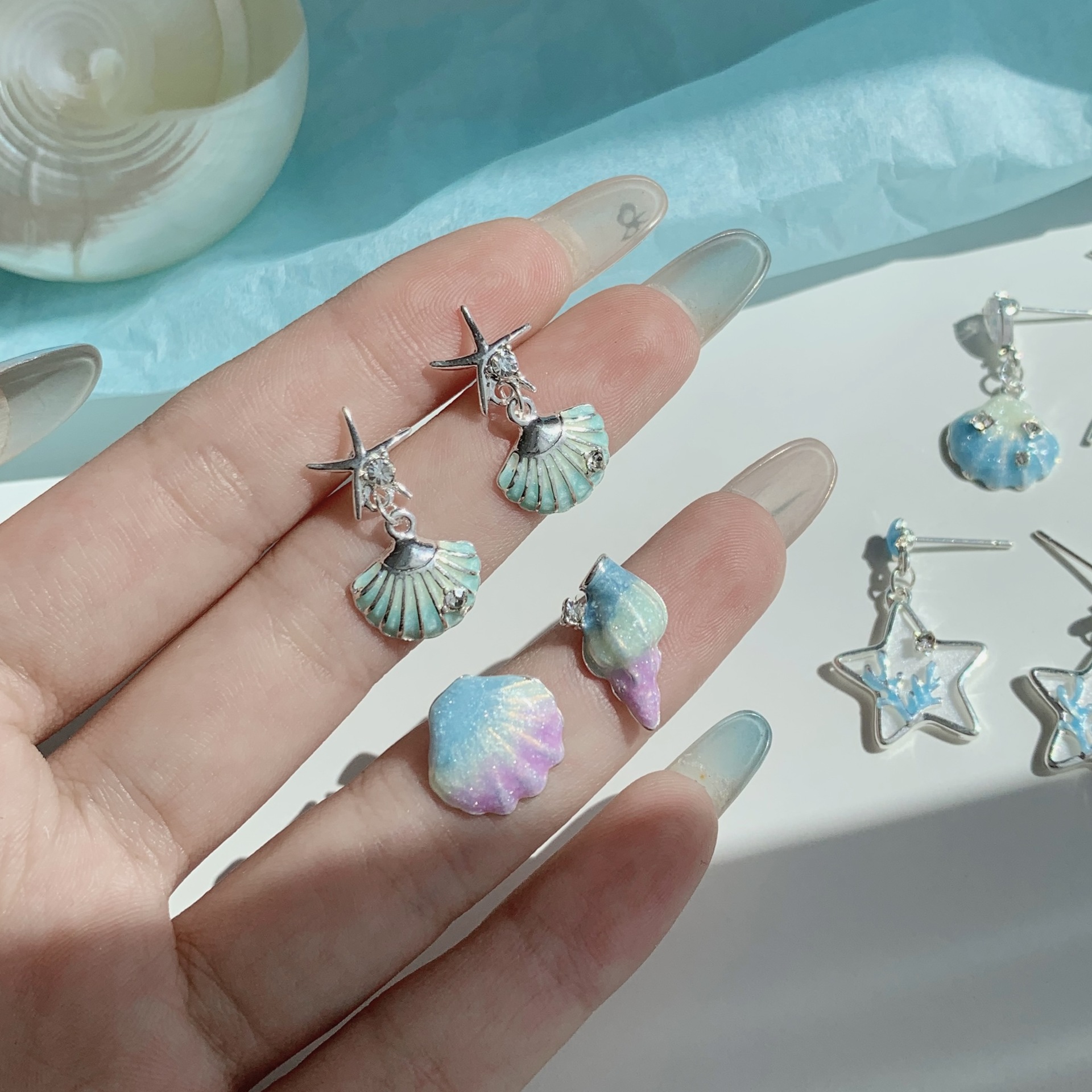 Summer super fairy ocean starfish shell zircon earrings, women's silver needle exquisite design sense pearl fish tail tassel earrings details Picture