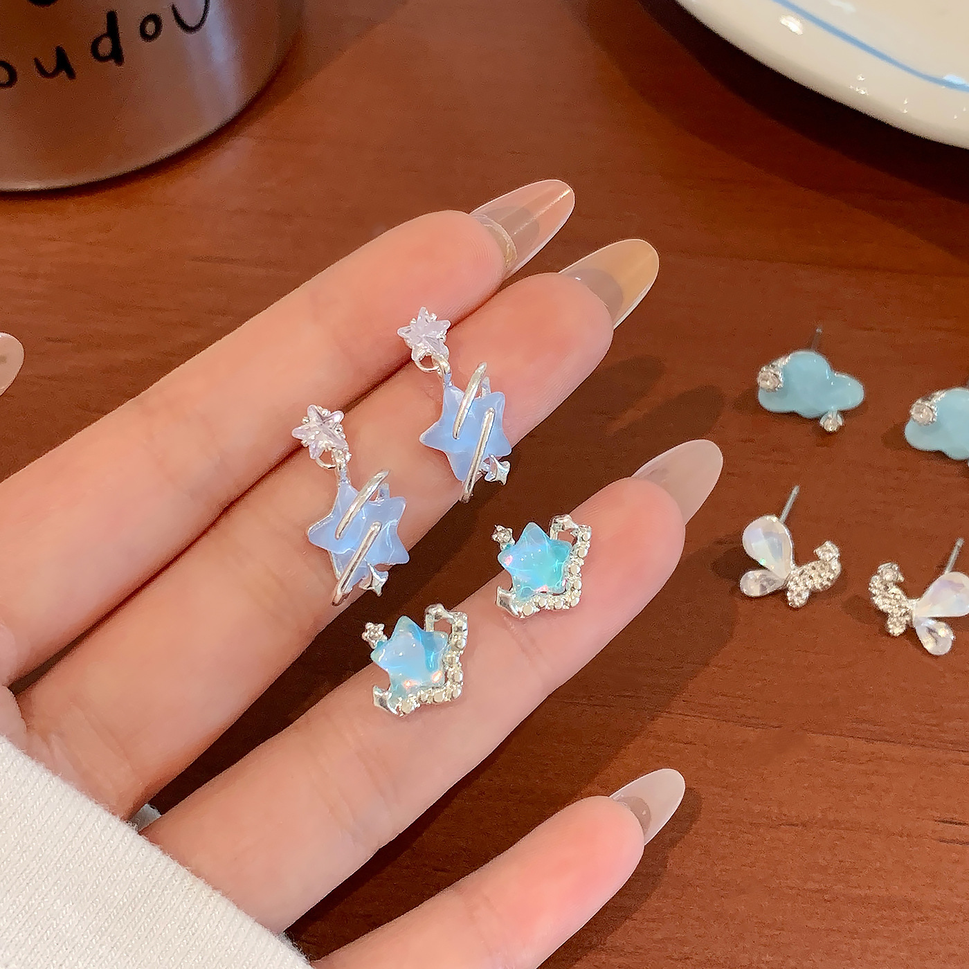 Summer's new Ocean Star stud earrings set for women's silver needles, light luxury, compact and high-end, super ethereal, sweet and versatile earrings Application Scenario
