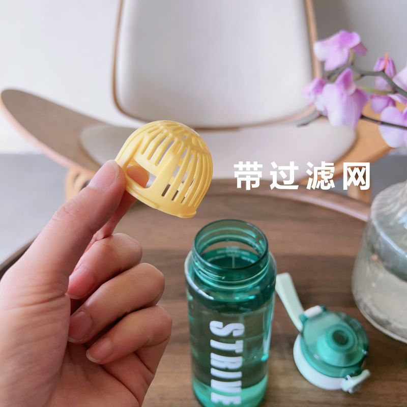 A small and simple plastic portable outdoor sports cup for male and female students with a tea strainer Application Scenario