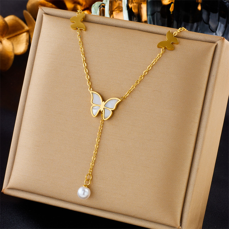European and American cross-border style, simple, light luxury, elegant titanium steel metal chain, tassel, pearl butterfly pendant, accessory necklace full figure