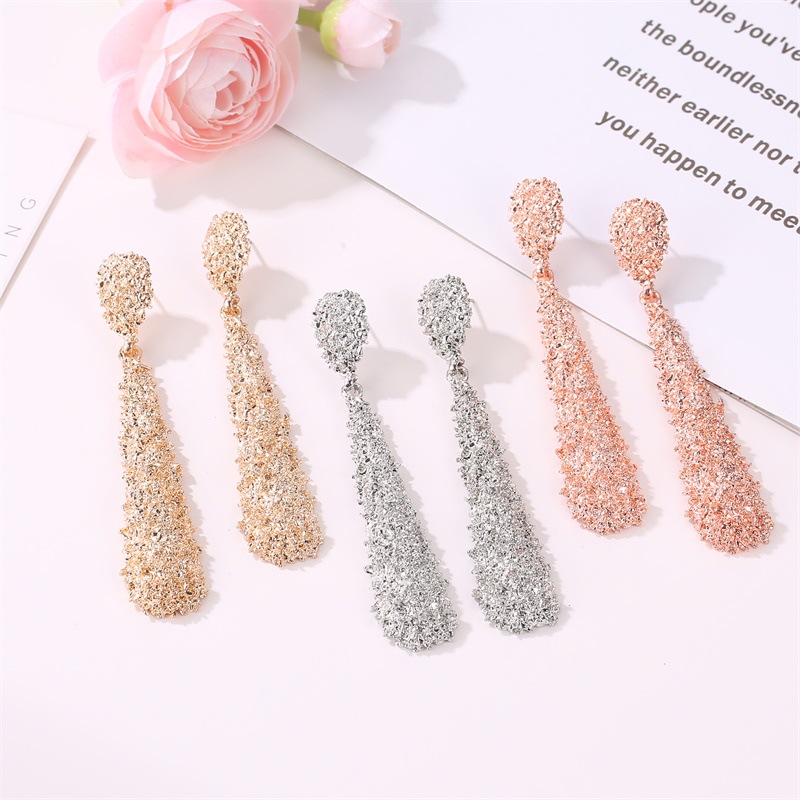 European and American exaggerated teardrop-shaped earrings for women, long embossed alloy matte stud earrings, cross-border fashionable earrings details Picture