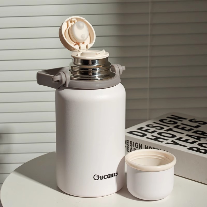 High-appearation-level insulated flask, portable outdoor office double-layer vacuum stainless steel cup handle, large-capacity insulated cup full figure