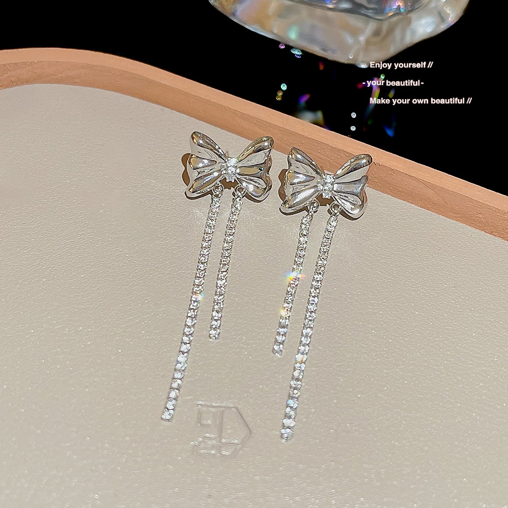 S925 silver needle, simple and elegant, versatile, bow long earrings, tassel, high-end, light luxury, cold style earrings for women Application Scenario