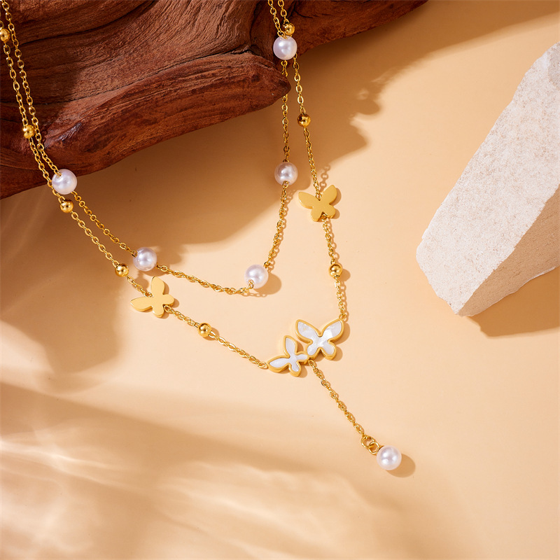 A fashionable, niche, retro and simple double-layer pearl butterfly accessory chain, stainless steel gold-plated jewelry necklace details Picture