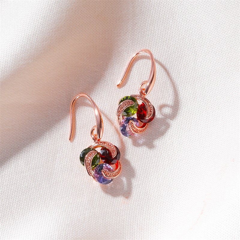 New best-selling earrings with a ladylike charm: slightly set zircon earrings and simple European and American colored diamond windmill earrings for women details Picture