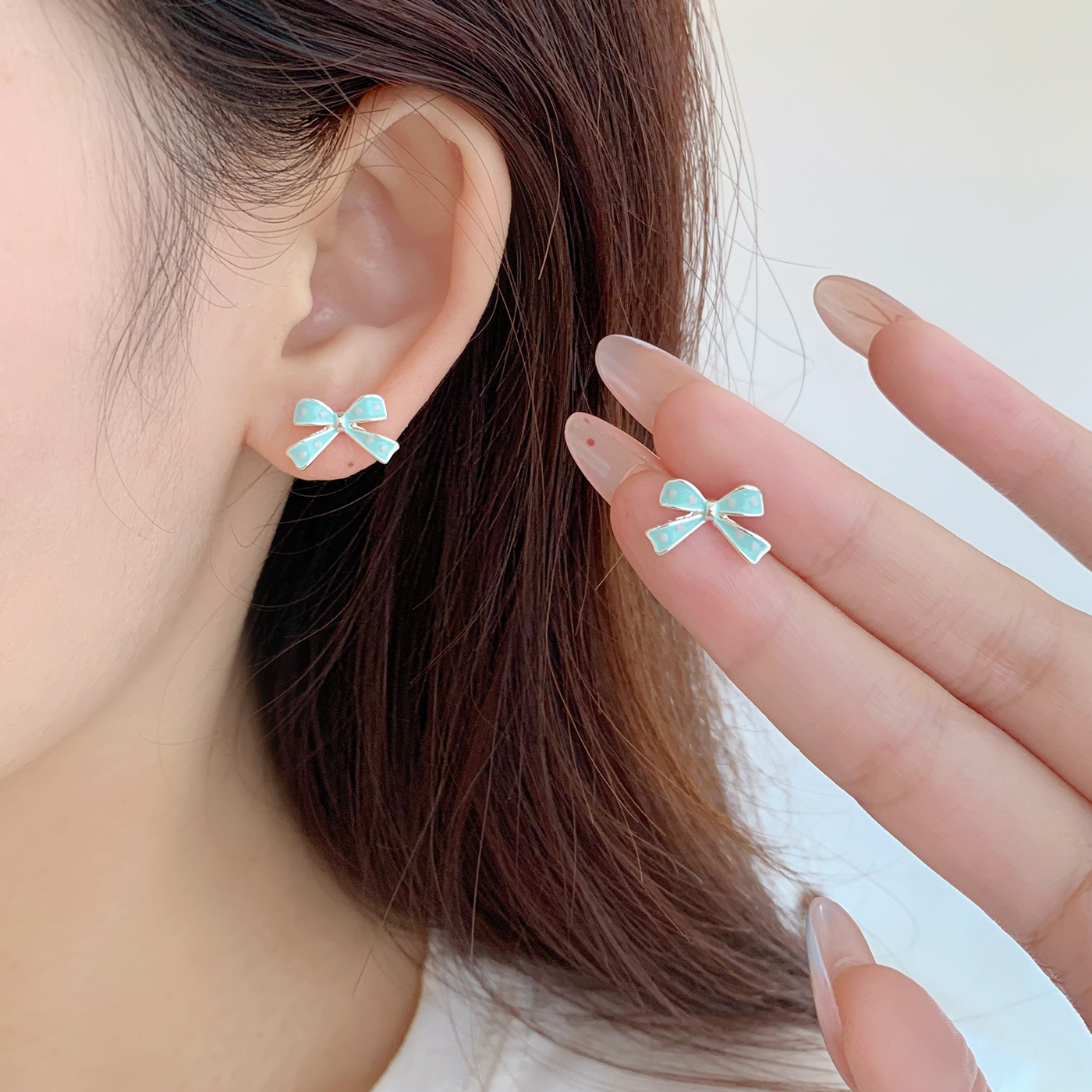Korean sweet oil-dripping polka dot bow stud earrings, small and simple new style, versatile and girlish heart earrings Specification drawing