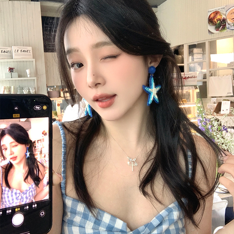 Spring and summer vacation style blue starfish earrings for women, light luxury, niche and high-end style earrings, elegant and grand stud earrings details Picture