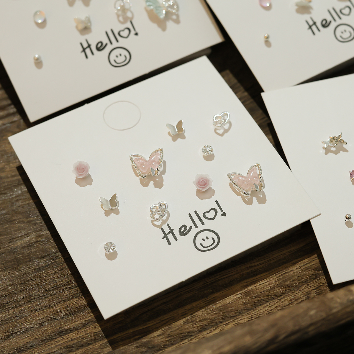 Sweet and cute silver needle, small and exquisite stud earrings, niche new set, ins fresh glitter butterfly earrings wholesale Application Scenario