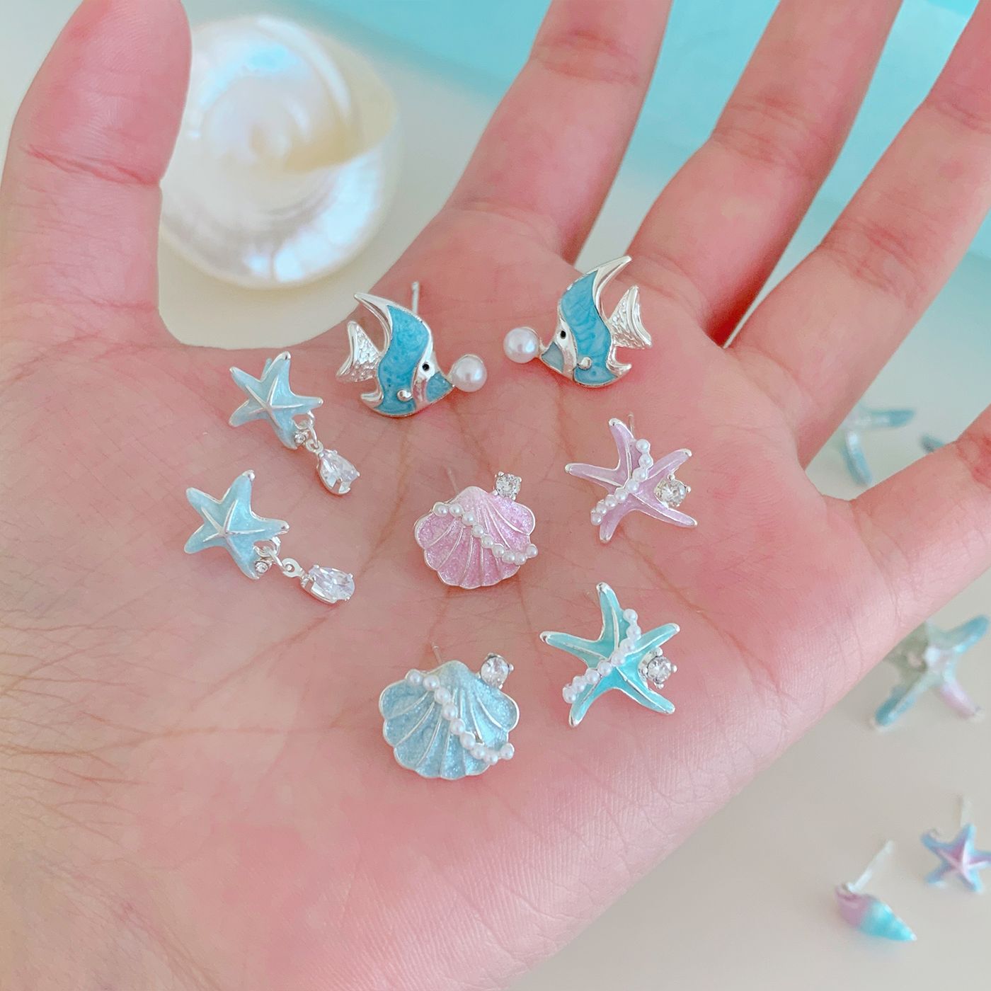 Ocean vacation style blue starfish shell stud earrings, women's silver needle, fresh and versatile design sense, exquisite and sweet earrings details Picture