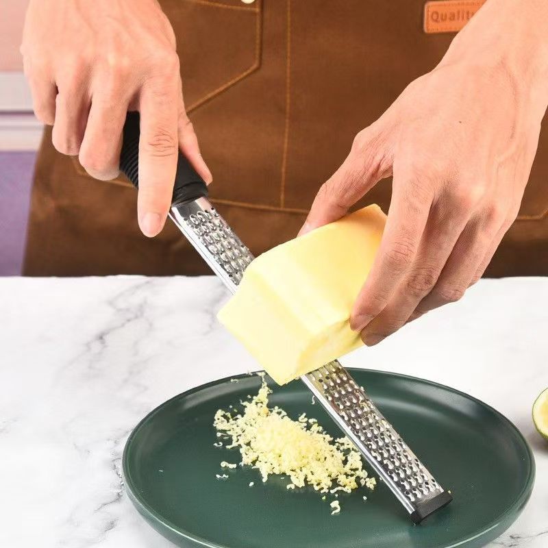 Grater, cheese peeling knife, Japanese cheese and lemon peel shavings grater, a shavings wonder, made of stainless steel Application Scenario