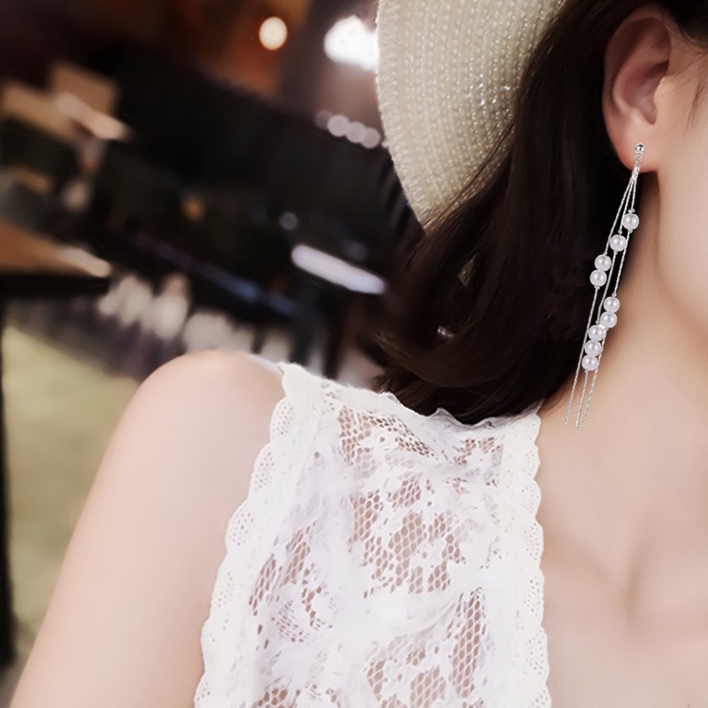 925 Silver needle chain pearl tassel earrings, a long and unique European and American style earring for women, a fashionable and elegant earpiece that has become a social media sensation Application Scenario
