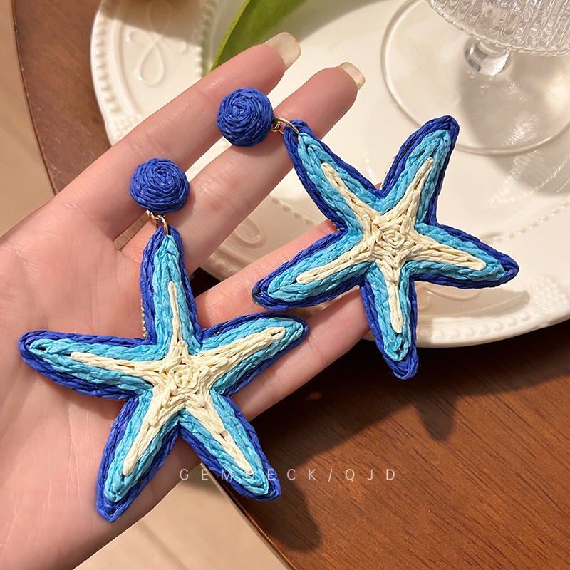 Summer exaggerated blue starfish earrings for women, contrasting colors, ins straw-woven vacation style stud earrings, beach photo earrings details Picture