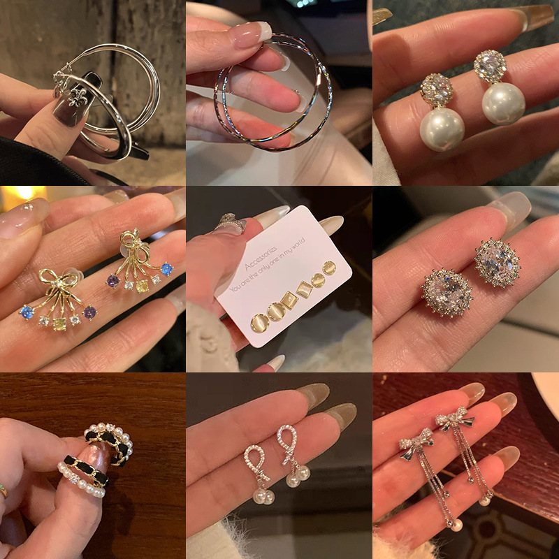 S925 Silver Needle Korean version exquisite Zircon earrings, female personality, Internet celebrity design sense, versatile and elegant earrings wholesale full figure