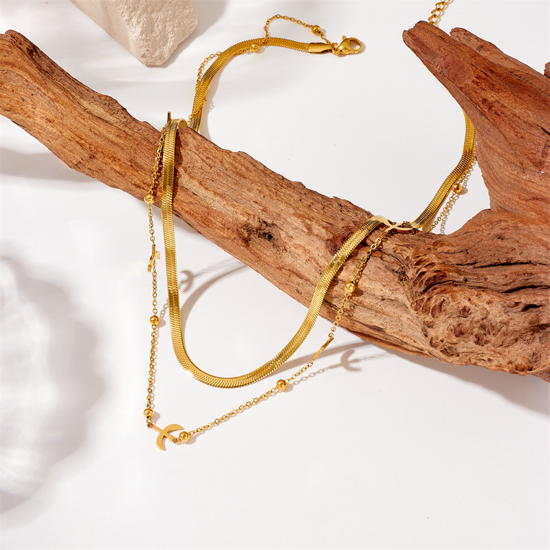 A fashionable, simple and niche design double-layered gold-plated titanium steel chain swallow accessory necklace details Picture