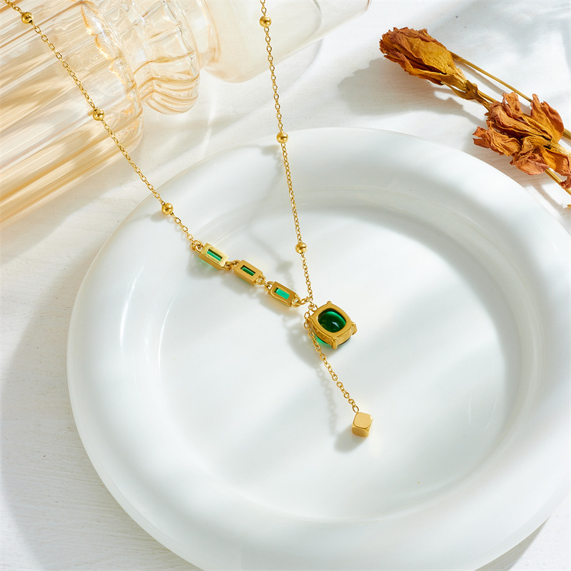 A fashionable, high-end, retro style diamond-encrusted square cut glass rhinestone pendant chain tassel titanium steel necklace details Picture
