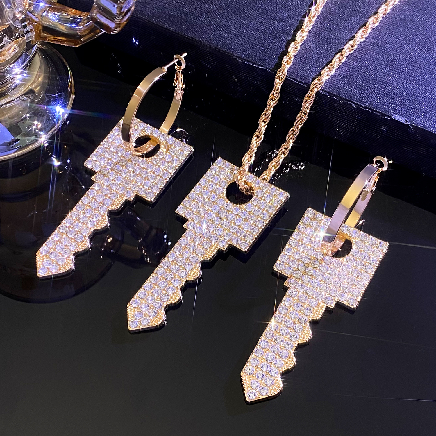 European and American cross-border fashion and creative ins metal design sense, full diamond light luxury key pendant earrings necklace women's jewelry details Picture