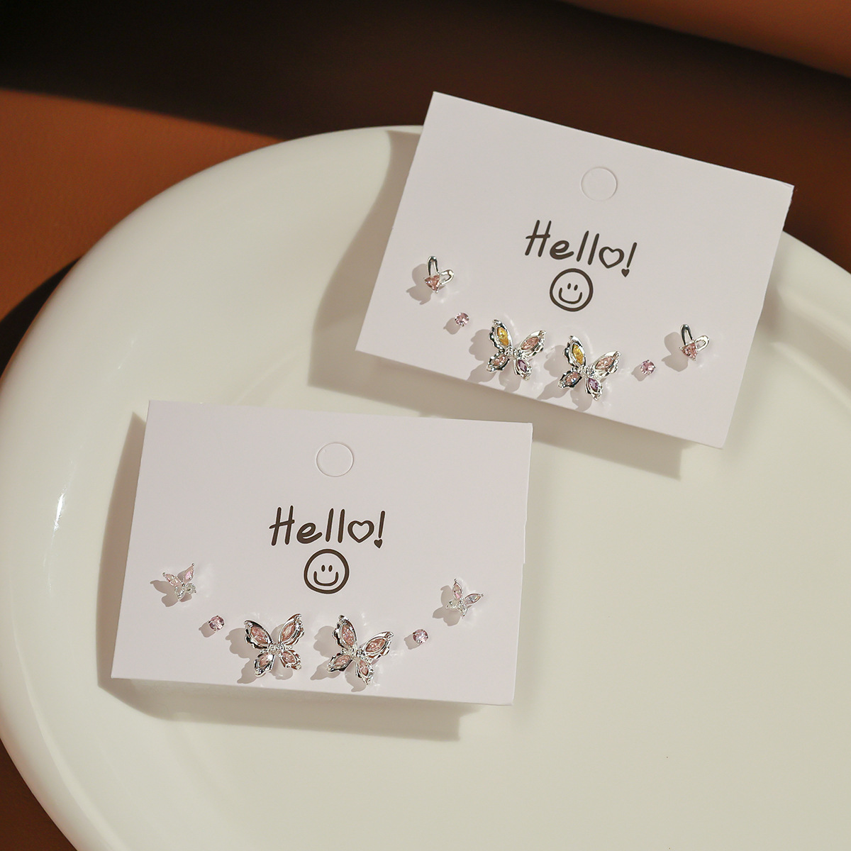 The 2024 new butterfly stud earrings feature a high-end and cold design, exuding a simple and elegant style for trendy women. They are alloy light luxury earrings full figure