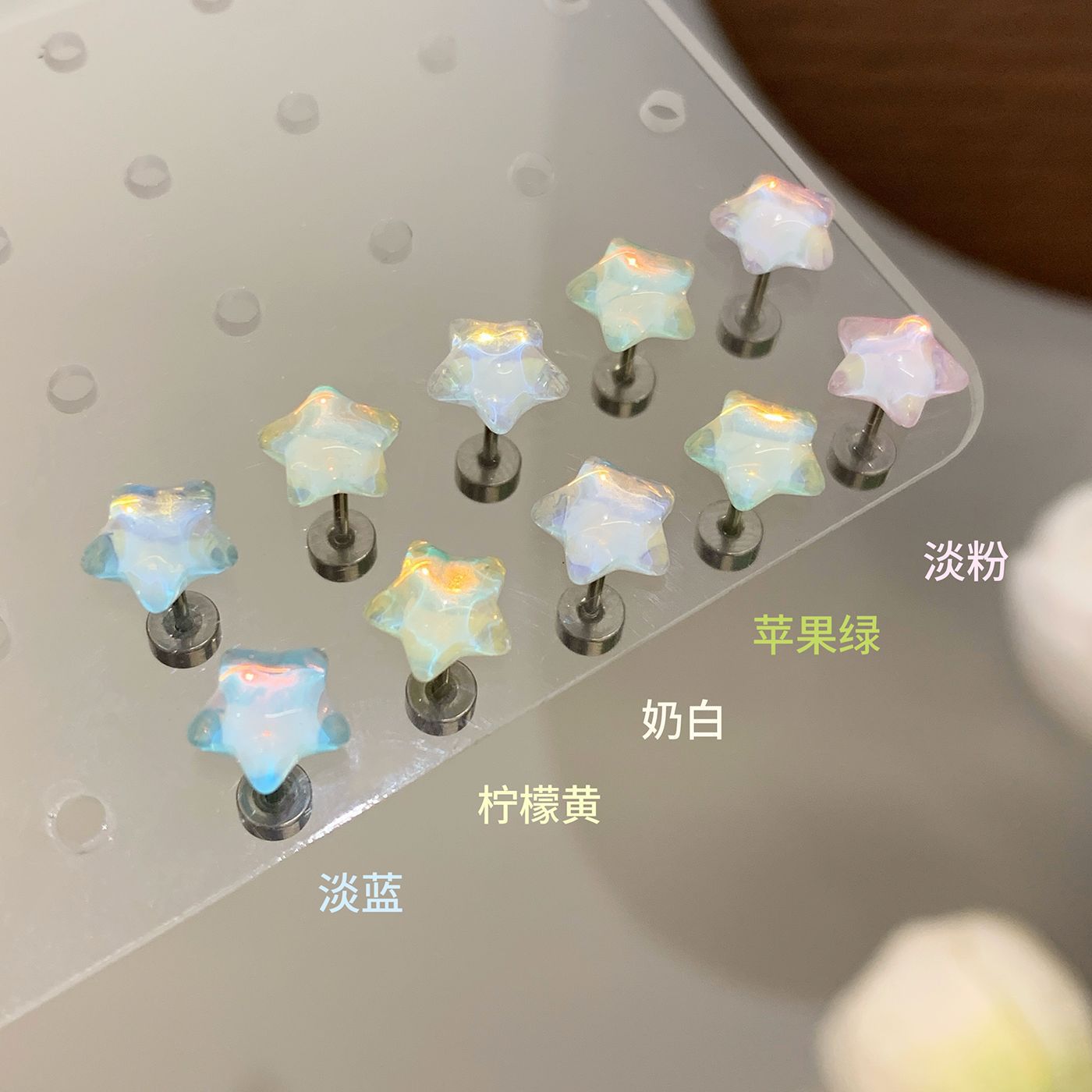 Fresh and sweet titanium steel colorful star stud earrings, women's silver needle, small, light luxury, high-end feel, versatile, whitening student earrings full figure