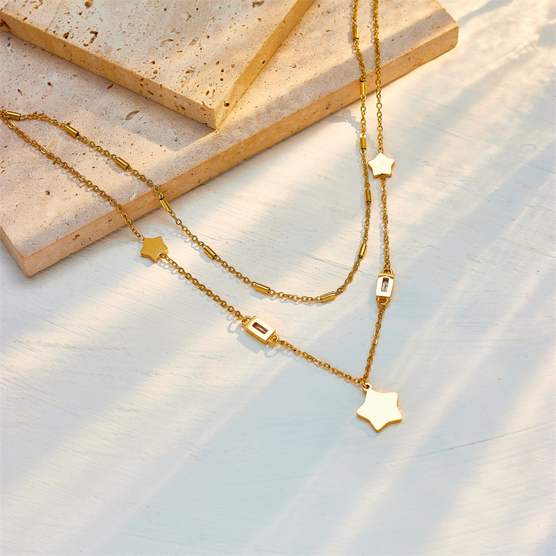A stylish and simple double-layered design with a unique black and white five-pointed star and diamond-encrusted square jewelry necklace details Picture