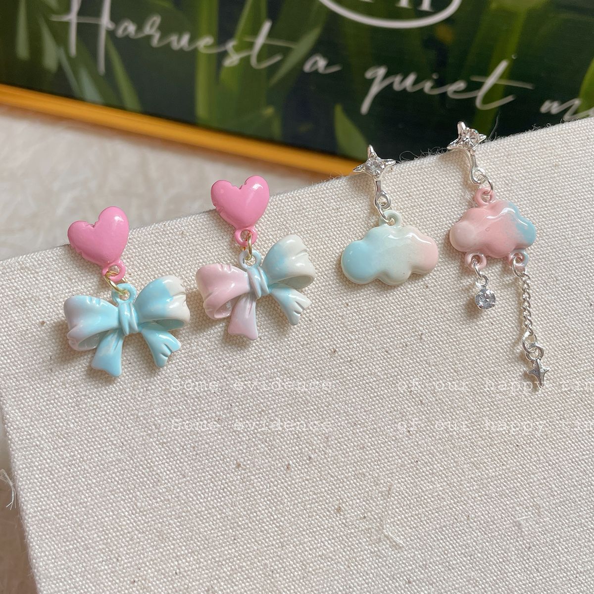 Summer's new rendered bow cloud earrings for women with silver needles, sweet, exquisite, unique and niche five-pointed star earrings Specification drawing