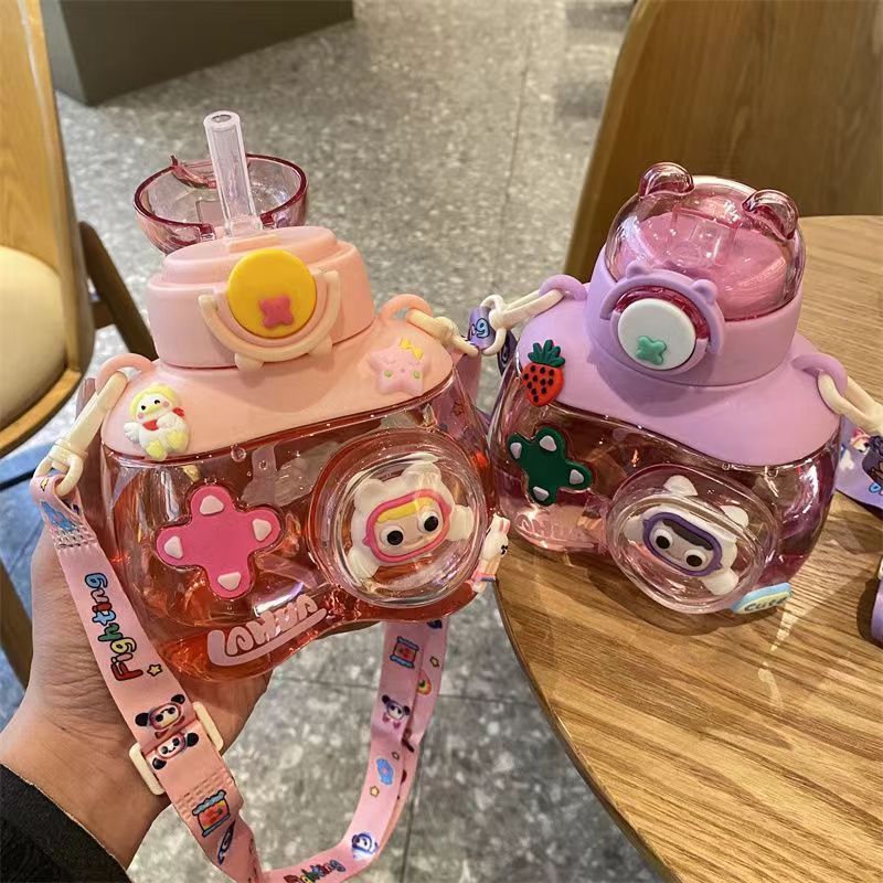 2024 New cartoon children's plastic water cup Straw cup O Little X Bear Shoulder strap portable high-temperature resistant student water bottle details Picture