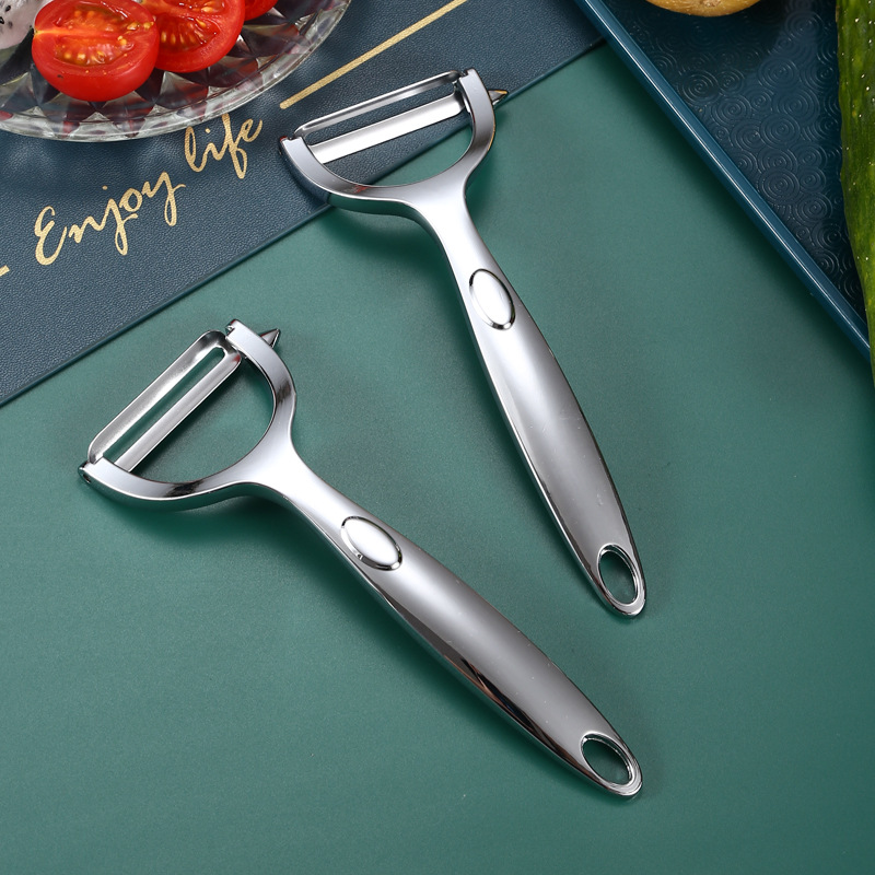 Stainless steel peeler, creative pumpkin and melon peeler, kitchen zinc alloy fruit and melon household peeler, peeling knife, peeler full figure