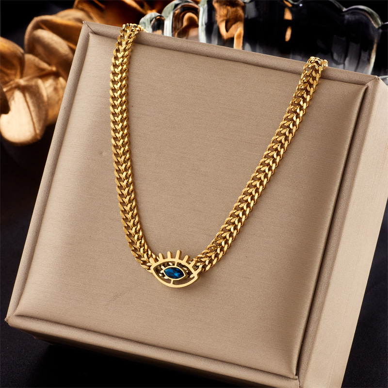 A new, simple, creative and personalized, hollowed-out blue eye titanium steel metal chain hip-hop necklace from Europe and America full figure