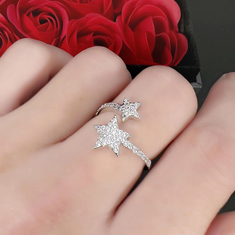 This is a niche design ring with a full diamond zircon star opening. It exudes a simple and luxurious feminine charm with a cold and elegant style details Picture