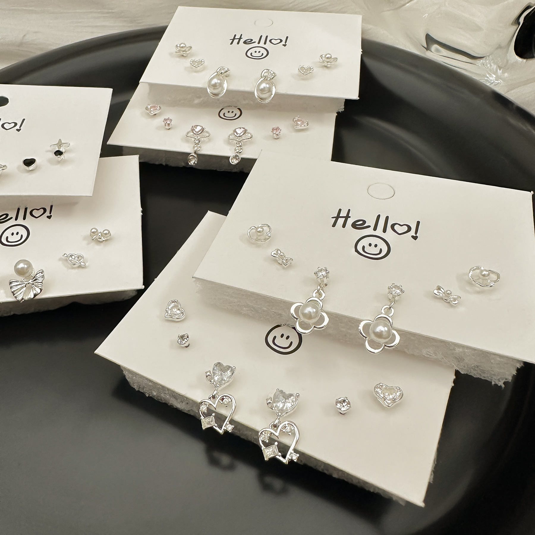 Silver needle stud earrings set, exquisite, light luxury, niche design sense, women's zircon bow heart-shaped sweet earrings wholesale details Picture