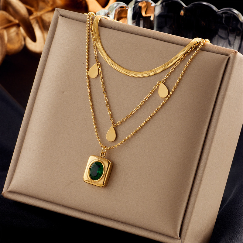 The French retro emerald multi-layer titanium steel necklace is fashionable and trendy. The geometric square water drop collarbone chain is light and elegant full figure
